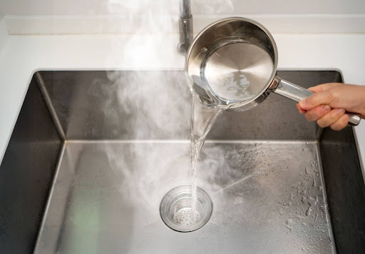 Featured image for “Is It Safe to Pour Boiling Water Down the Drain?”