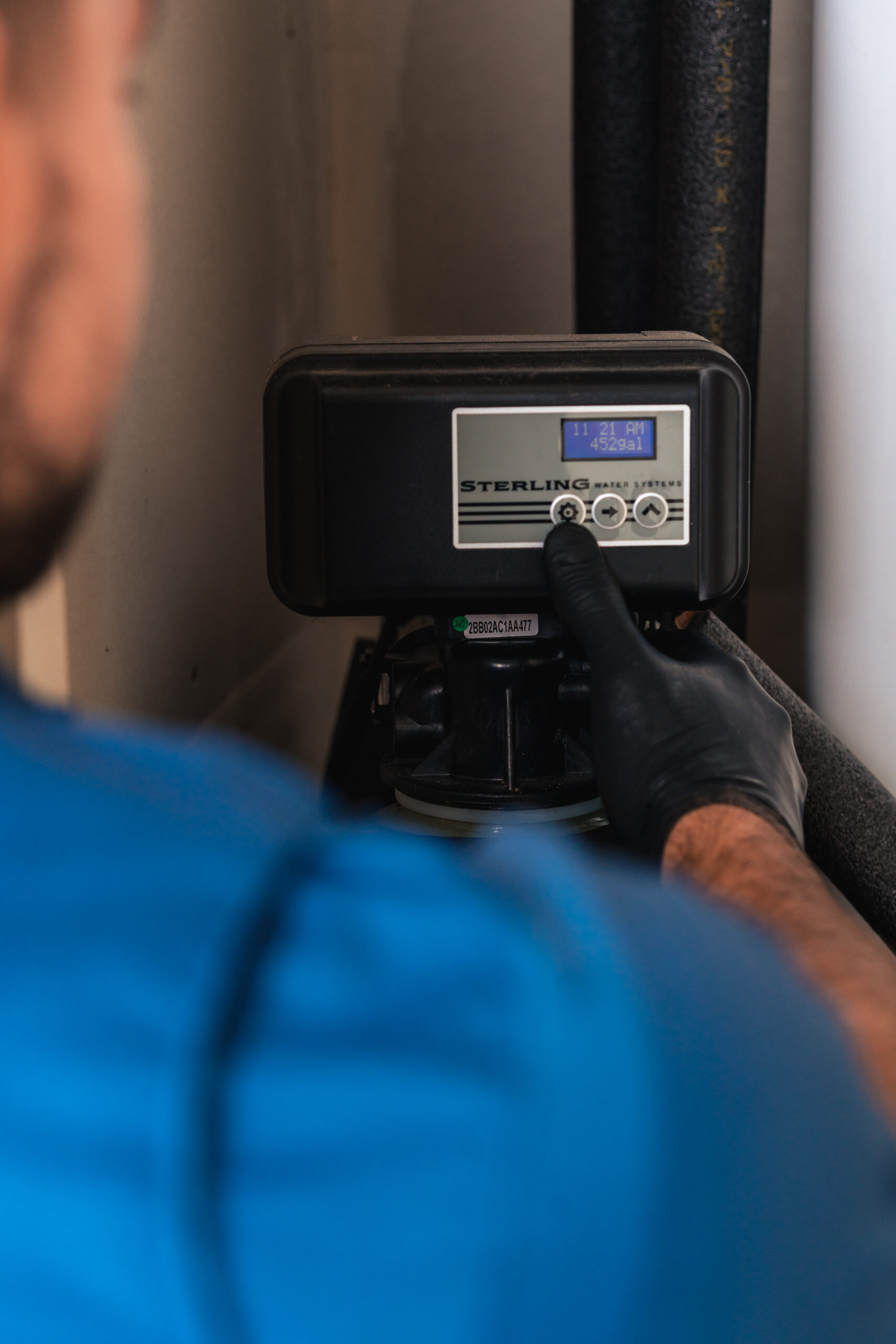 man using diagnostic tool