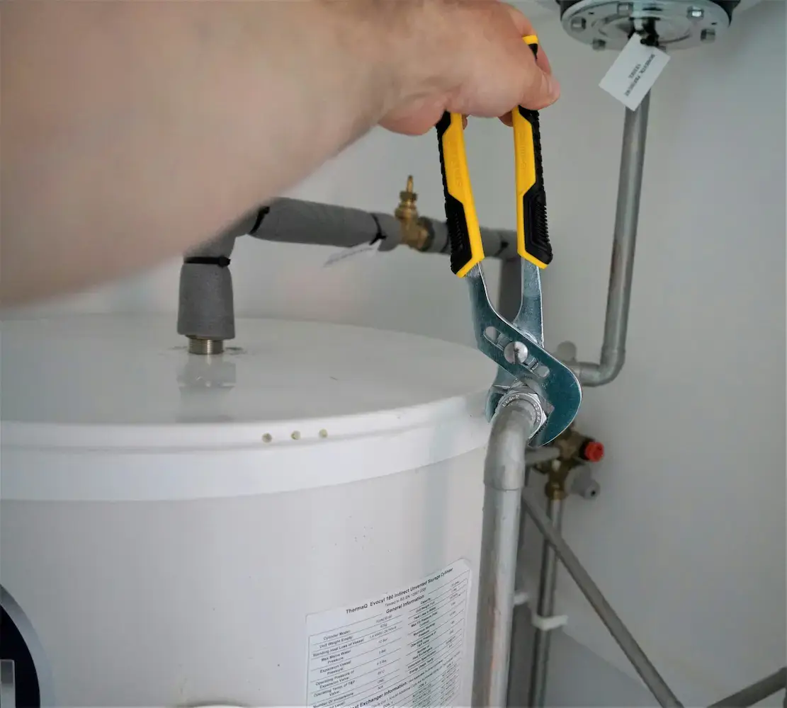 Williams plumber performing drain clearing service in Tulsa